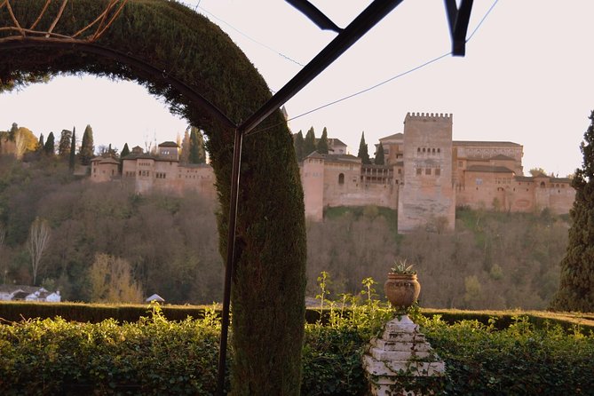 Alhambra Private Tour & Nazaries Palaces from Seville with Pickup - Entering the Alhambra and Nasrid Palaces
