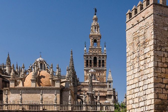 Best Private half day Tour of Sevilla with Hotel pick up - Torre del Oro along the river