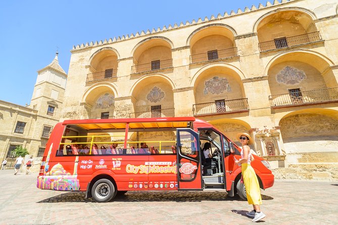 City Sightseeing Cordoba Hop-On Hop-Off Bus Tour - Audio commentary, headphones, and the top deck