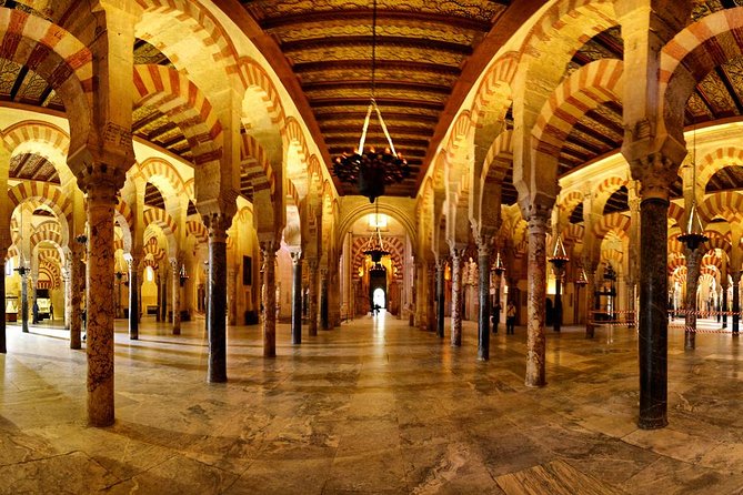 Cordoba & Carmona with Mezquita, Synagoge & Patios from Seville - Walking through La Judería