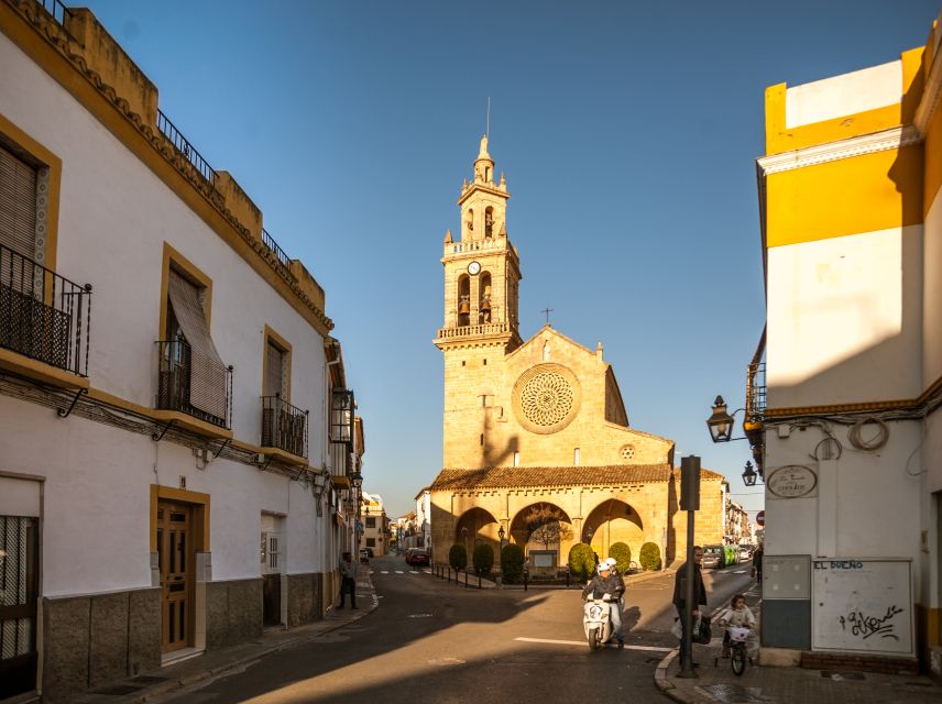 Córdoba: City Sightseeing Hop-On Hop-Off Bus Tour - The blue minibus through Córdoba’s tight streets