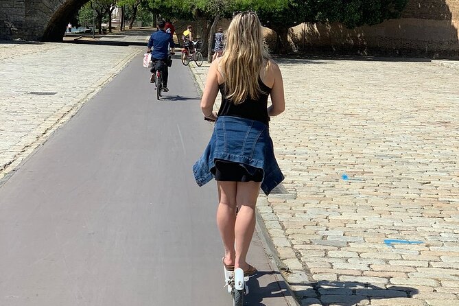 Electric Scooter Rental Seville - Crossing Triana Bridge into Triana