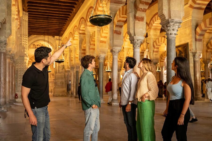 From Madrid: Córdoba Private Day Tour by High-Speed Train - Walking through San Basilio and the Jewish Quarter
