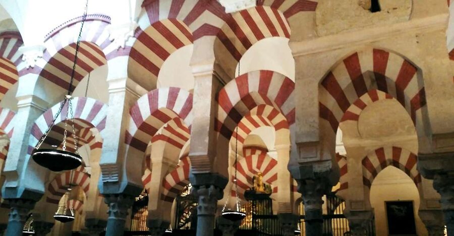 From Seville: Full-Day Essential Córdoba Tour - Walking through Cordoba’s Jewish Quarter