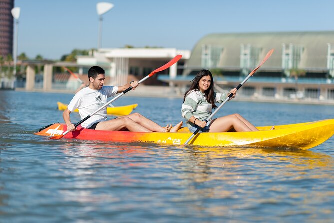 Kayak Guided Tours - Torre Sevilla and the modern riverfront