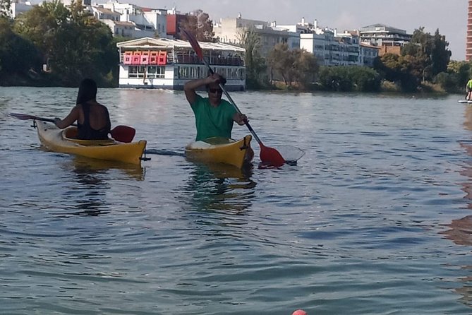 Kayak Guided Tours - Passing San Telmo and the Torre del Oro