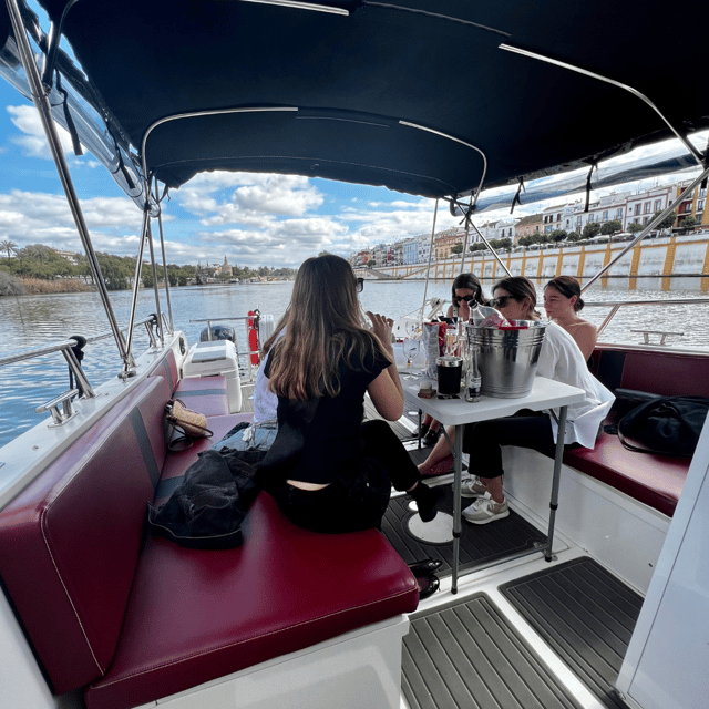 Private boat trip on the Guadalquivir - Triana, Calle Betis, and Isabel II Bridge
