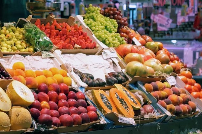 Sevilla Food Tour: Tapas, Wine, History & Traditions - Carrillada, spinach, and a football conversation