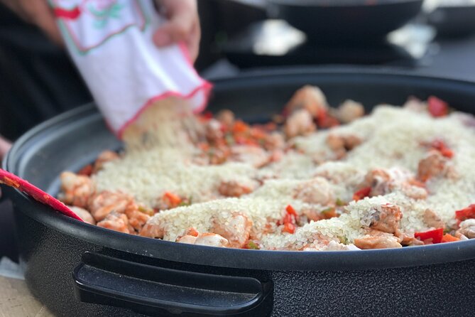 Sevilla: Rooftop Paella Cooking Class & 30-minute expert Q&A - Meeting at the Roman Columns on Calle Mármoles