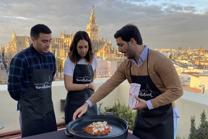 Sevilla: Rooftop Paella Cooking Class & 30-minute expert Q&A - Welcome drinks, appetizers, and the start of the class