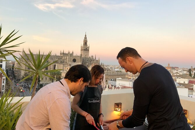 Sevilla: Rooftop Paella Cooking Class & 30-minute expert Q&A - Eating the paella you helped make