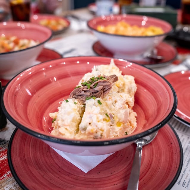 Seville Adventure: Historic Walking Tour & Traditional Tapas - San Telmo Palace and the Torre del Oro