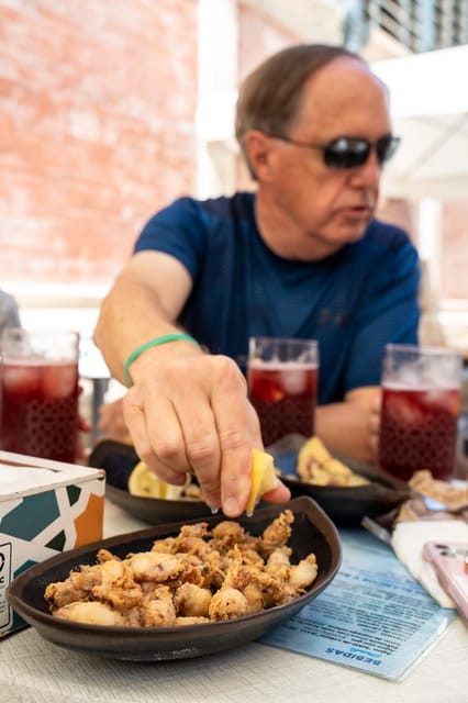 Seville Adventure: Historic Walking Tour & Traditional Tapas - Tapas, timing, and the $79 price