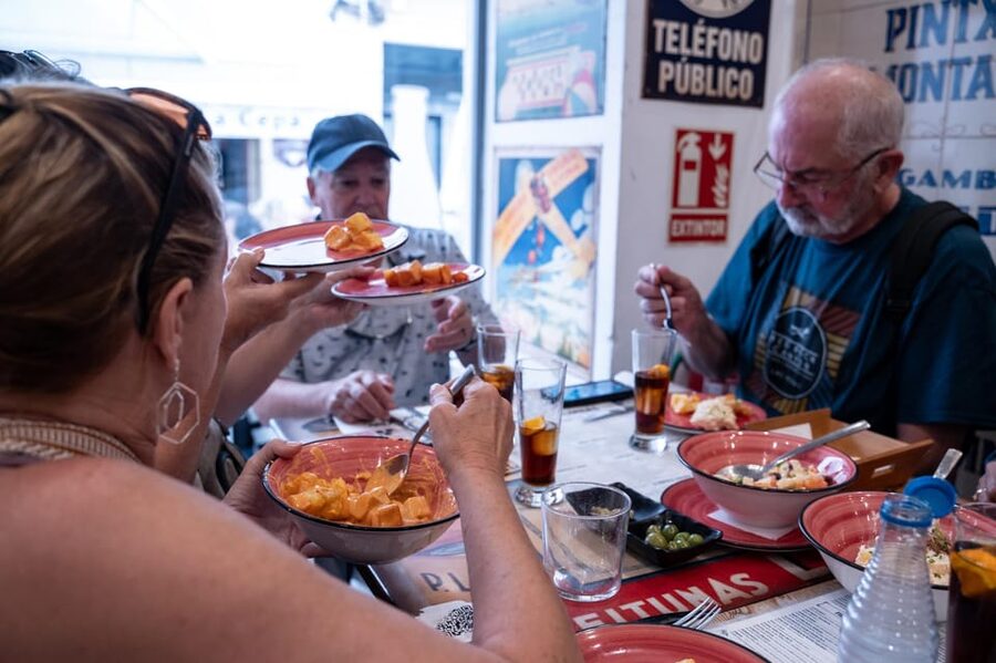 Seville Adventure: Historic Walking Tour & Traditional Tapas - Plaza del Triunfo and Seville’s great monuments