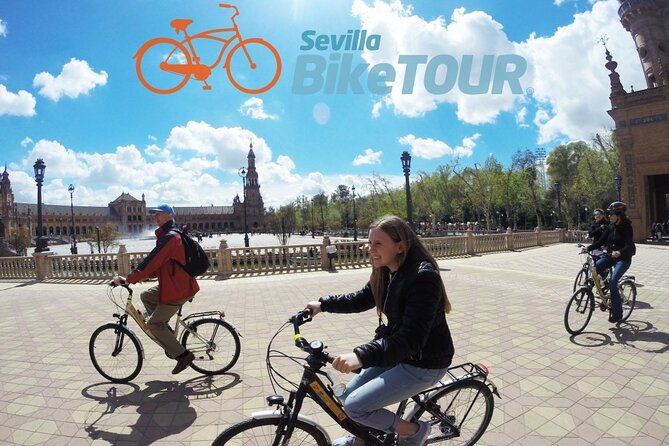 Seville Bike Tour - The river and Torre del Oro connect old Seville to the port