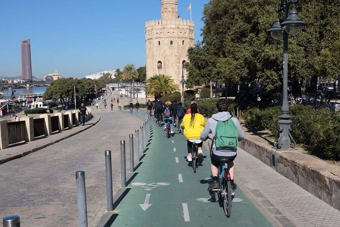 Seville Bike Tour Following the Guadalquivir River - Following the river and cutting through the parks