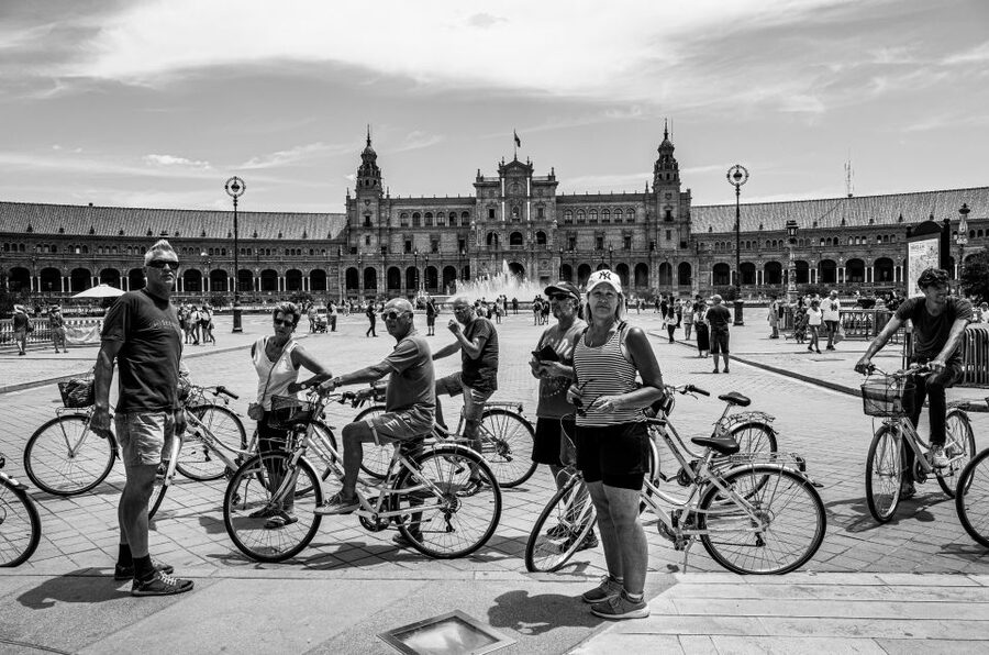 Seville: City Sightseeing and Local Culture Bike Tour - What the guides add to the ride