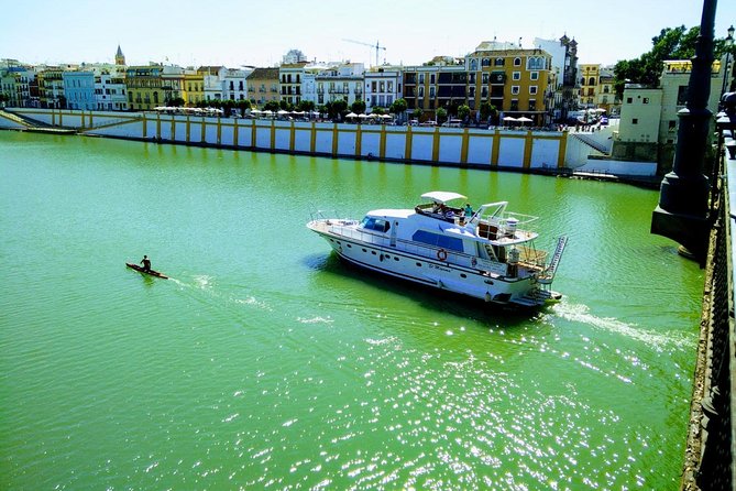 Seville: Cruise along the Guadalquivir River with appetizer - The return trip, tapas, and a drink