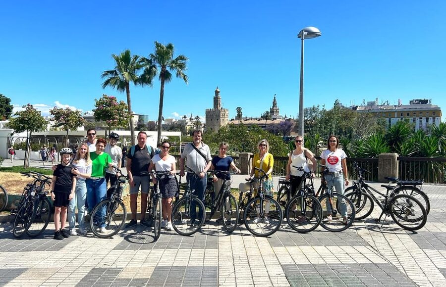 Seville: Dutch Cycling Highlights Tour with local guide - Crossing into Triana
