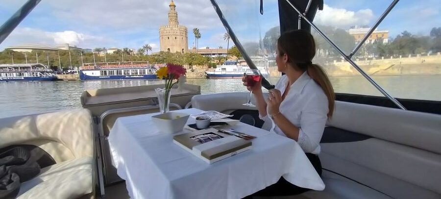 Seville: Exclusive River Boat Tour with Tapas - What the guide adds to the experience