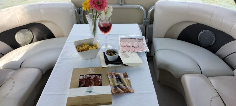Seville: Exclusive River Boat Tour with Tapas - Starting beneath the Isabel II Bridge