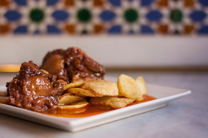 Seville Food Tour: Vermut, Churros & 10+ Tasty Local Dishes - Plaza de España and María Luisa Park