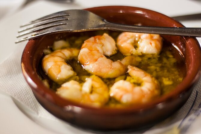 Seville Food Tour: Vermut, Churros & 10+ Tasty Local Dishes - The Alcázar: royal power beside everyday food
