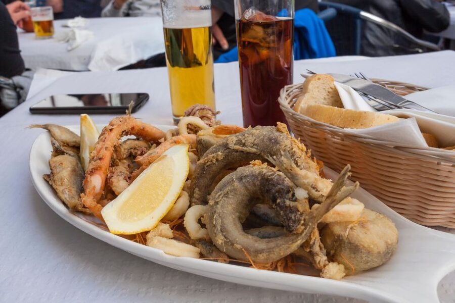 Seville Food Tour with Tapas & Drinks with a Local - Pringá and croquetas: Seville’s hearty side