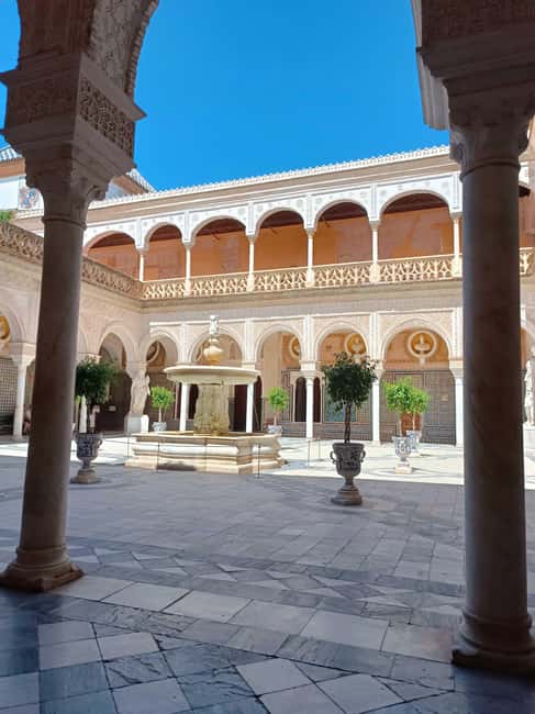 Seville: Guided visit of the Casa de Pilatos with entrance tickets - Courtyards, tilework, and the weather question