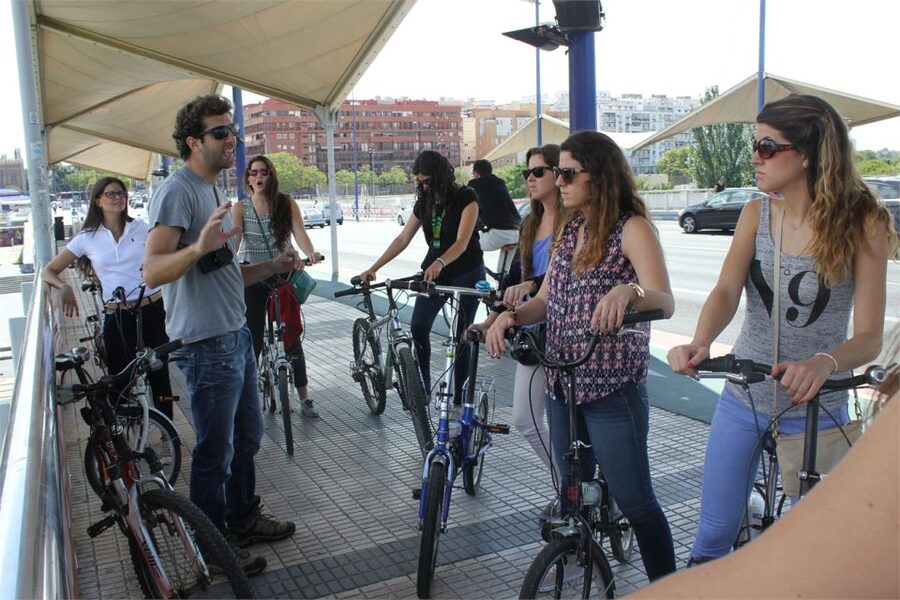 Seville: Highlights Bike Tour with Local Guide - Crossing into Triana