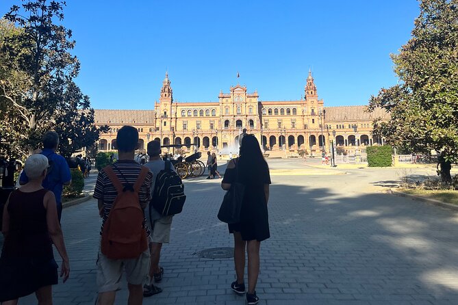 Seville Highlights Private Walking Tour - Walking toward Plaza de España