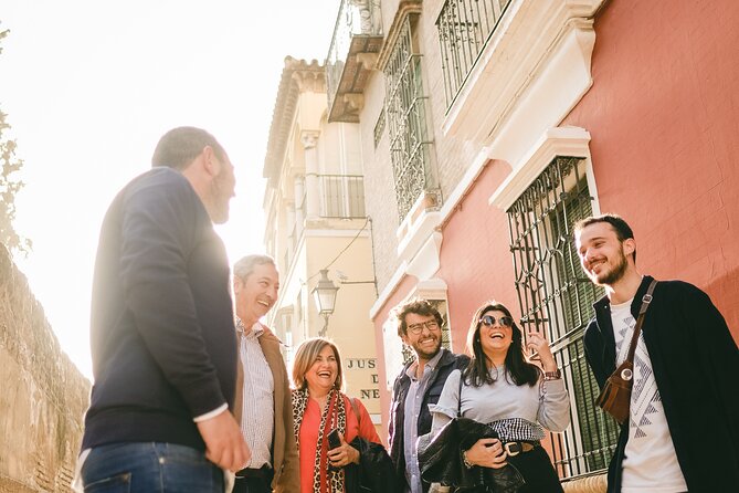 Seville Jewish Quarter Small Group Tour with Tapas and Drinks - Starting beside the Alcazar at Plaza del Triunfo