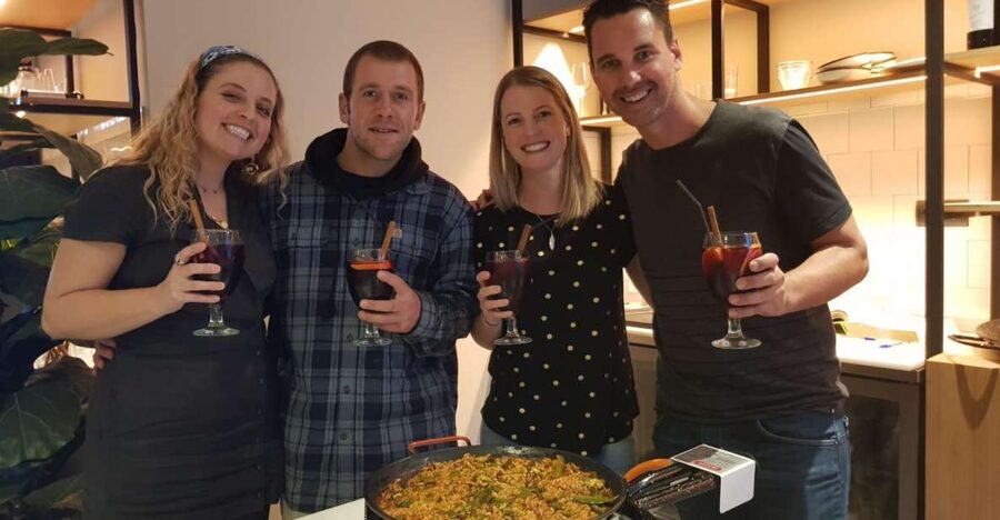 Seville: Paella and Sangria Experience - Watching paella take shape in Seville