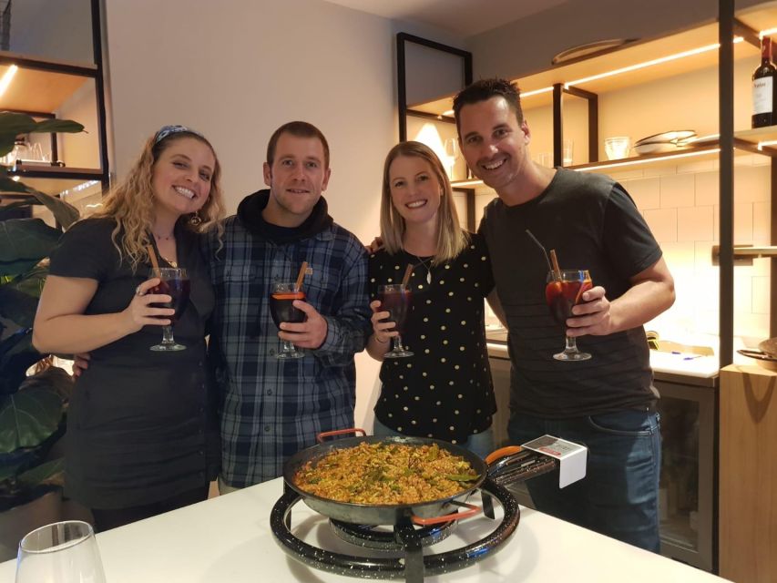 Seville: Paella and Sangria Experience - The opening spread of olives, cheese, and Iberian chacina
