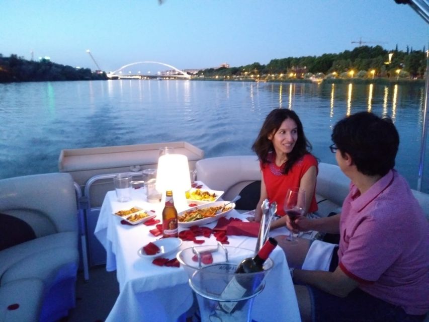 Seville: Private Boat Tour with Paella Lunch and Drinks - A private view of Seville from the Guadalquivir