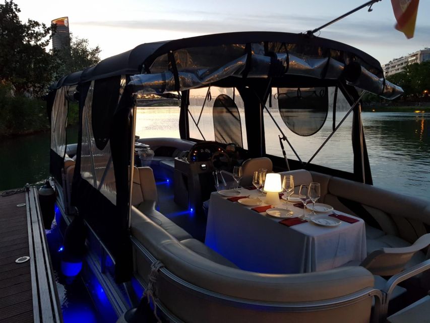 Seville: Private Boat Tour with Paella Lunch and Drinks - Meeting the boat near Triana Bridge