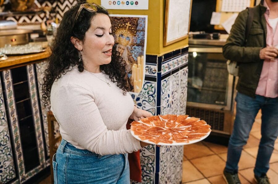 Seville: Private Tapas & History Tour in Triana Neighborhood - The first taste: vermouth and old-school tapas at Bar Santa Ana
