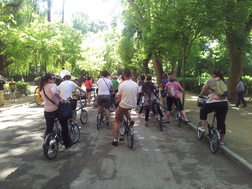 Seville: Relaxing Electric Bike tour with Tour Guide - Starting among the lanes of Barrio Santa Cruz