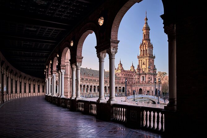 Seville Scavenger Hunt and Highlights Self Guided Audio Tour - Torre del Oro beside the river