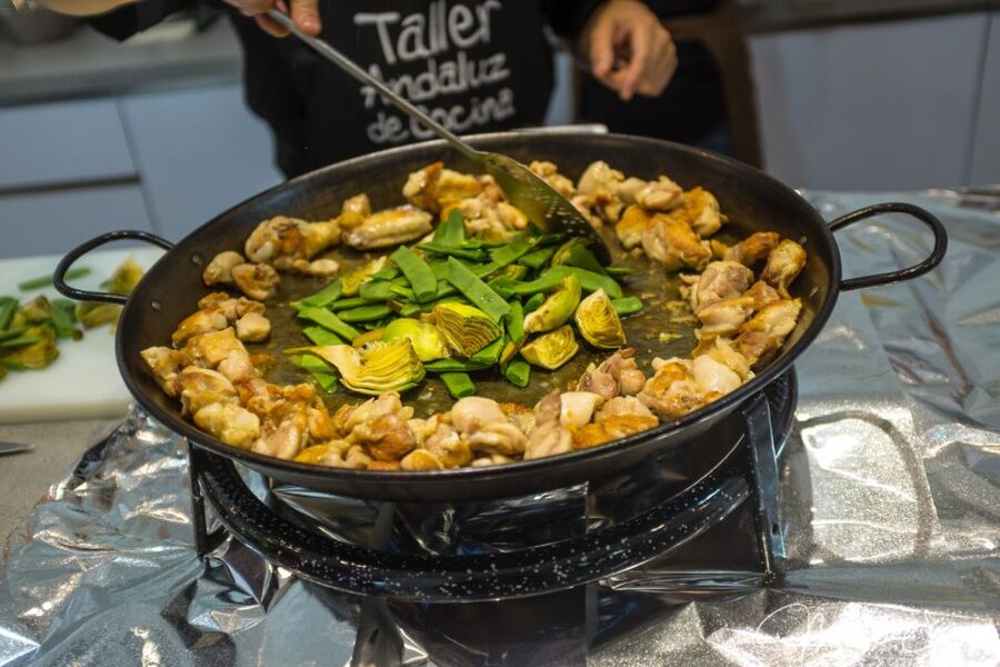 Seville: Spanish Cooking Class with Dinner - Cooking Spanish food inside Triana Market