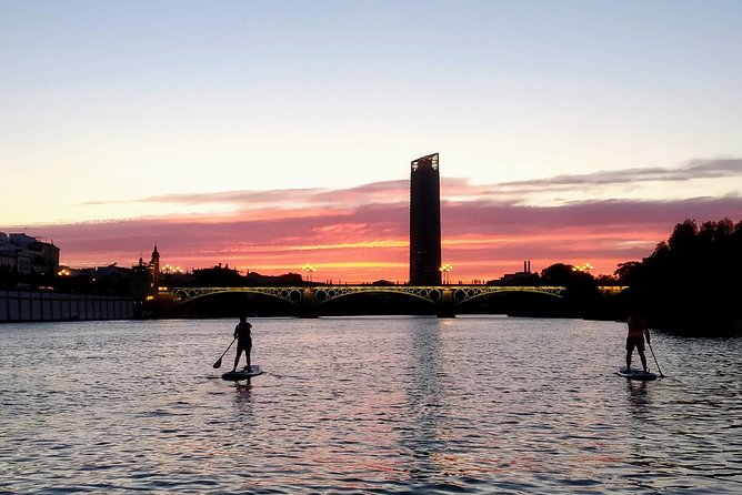 Seville: Sunset in Paddle Surf - Paddling toward the Torre del Oro