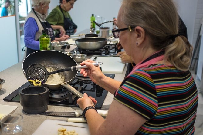 Spanish Cooking Class & Triana Market Tour in Sevilla - Learning from chefs such as Pedro, Carlo, and Diana
