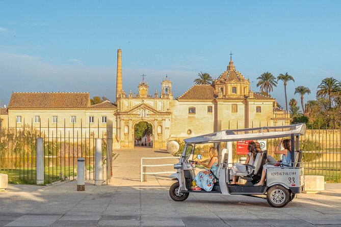 Tour Welcome Seville with Local Guide in Eco Tuk Tuk Private - San Telmo and the old tobacco factory