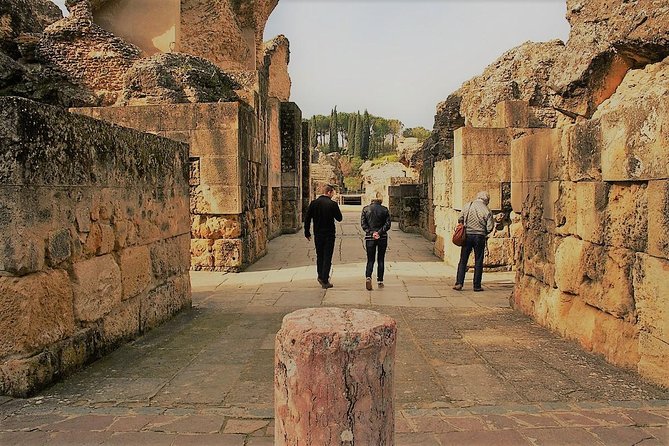 Visit to Italica Roman Ruins Tour tickets included - Entering the amphitheater